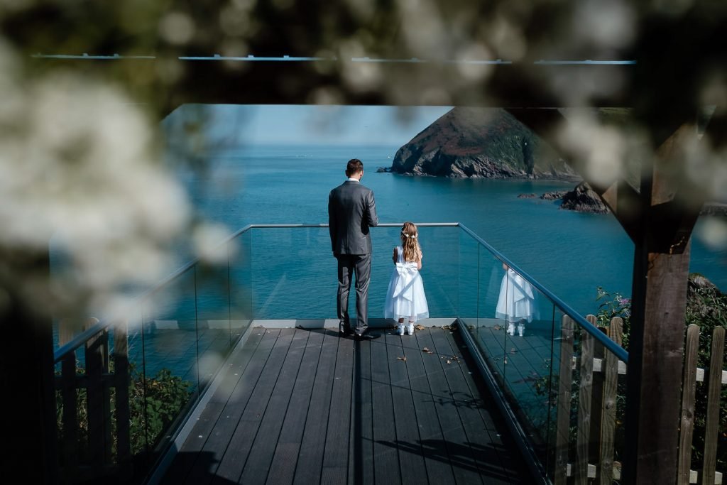 groom and daughter on deck at sandy cove