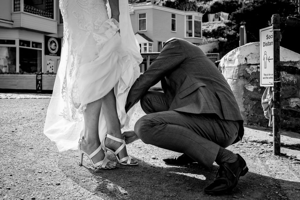 bride and groom on beach at sandy cove wedding
